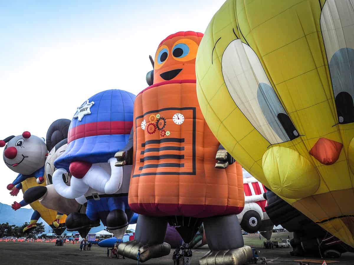 hot air balloons shaped like looney tunes characters