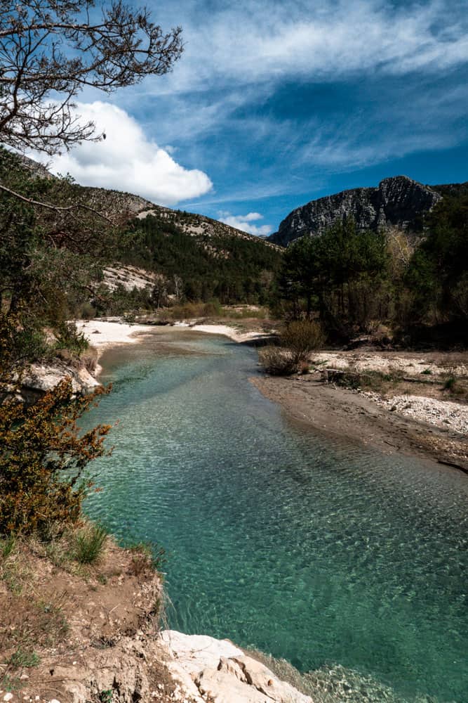 clear blue water of the Verdon River and mountainous landscape of the route napoleon