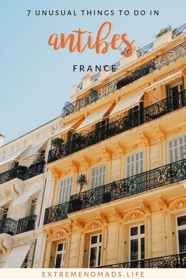 pinterest image with a picture of a pale yellow building and fancy wrought iron balconies with the caption '7 unusual things to do in antibes france'