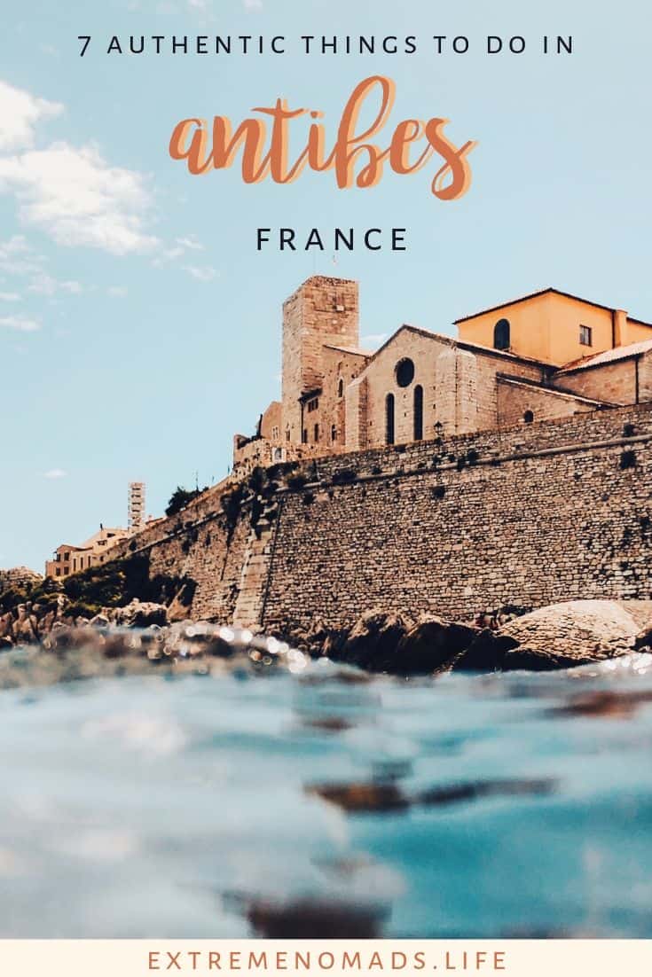 pinterest image with a picture of a castle like building perched on the edge of the water with the caption '7 authentic things to do in antibes france'