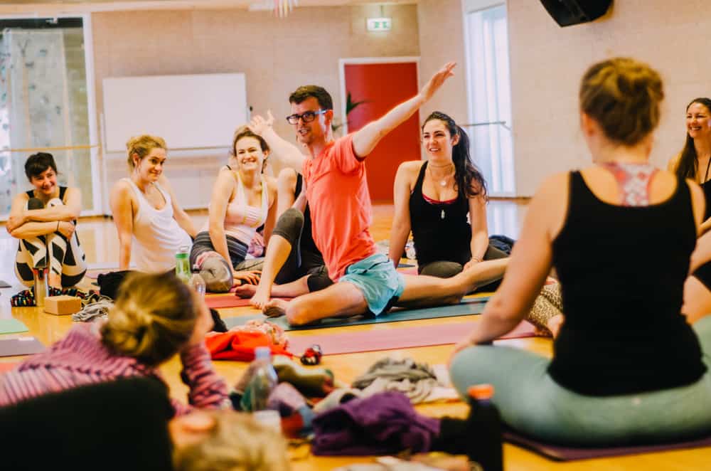 Stephen teaching a yoga class at Yogi Nomads yoga festival in Europe.