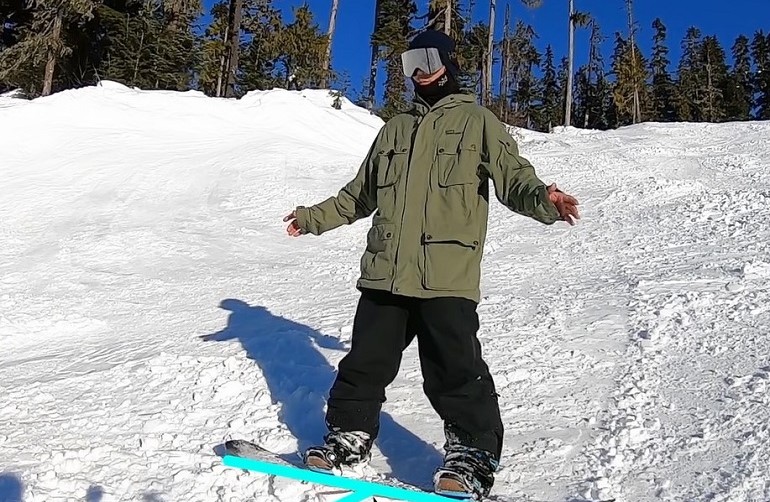 wie man auf dem Snowboard bremst