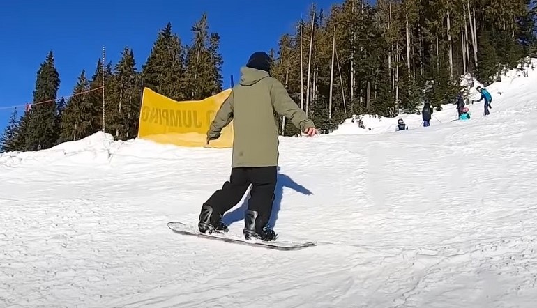 wie man beim Snowboarden anhält