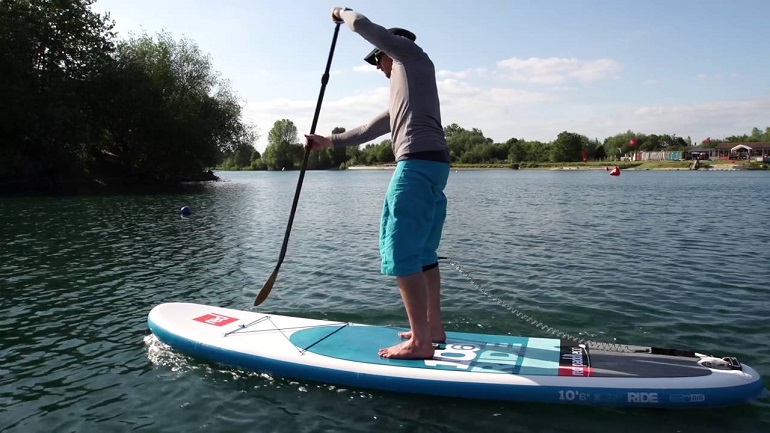 ride waves on inflatable paddle boards