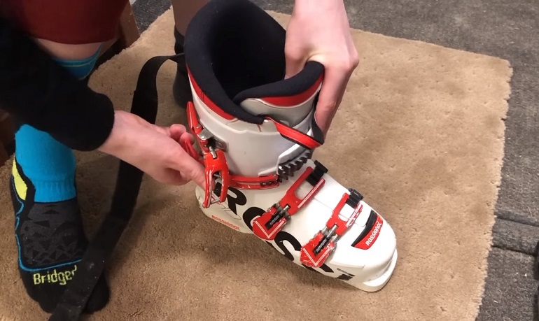 how tight should ski boots be